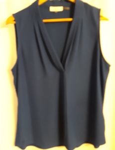 Never worn sleeveless deep blue top